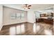 Open-concept living room with kitchen in the background at 2327 Glenway Trail Ct, Pineville, NC 28134
