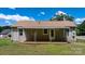 A charming back porch with awning provides a relaxing outdoor space with views of the lawn at 2336 32Nd Ne St, Hickory, NC 28601