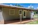 A covered back porch with decorative awning and metal supports offers a shady and functional outdoor area at 2336 32Nd Ne St, Hickory, NC 28601