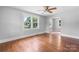 Spacious bedroom features hardwood floors, neutral paint, large windows and convenient access to other rooms at 2336 32Nd Ne St, Hickory, NC 28601