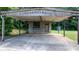 A large carport is attached to the house, providing sheltered parking at 2336 32Nd Ne St, Hickory, NC 28601