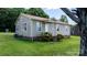 Well-maintained home featuring gray siding and a green lawn in a lovely neighborhood at 2336 32Nd Ne St, Hickory, NC 28601