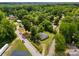 Picturesque aerial shot of a neighborhood home with manicured lawns and lush greenery at 304 Miller Ave, Salisbury, NC 28144