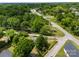 A high angle shot of a home in a neighborhood surrounded by green landscaping and quiet streets at 304 Miller Ave, Salisbury, NC 28144