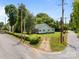 Charming home with a well-manicured lawn and mature trees at 304 Miller Ave, Salisbury, NC 28144