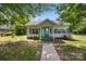 Charming home with a quaint front porch, a well-manicured lawn, and a classic architectural design at 304 Miller Ave, Salisbury, NC 28144