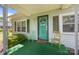 Charming front porch with cozy seating, enhancing the home's curb appeal and inviting atmosphere at 304 Miller Ave, Salisbury, NC 28144