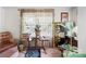 Cozy living room space with eclectic decor, vintage table and inviting atmosphere at 304 Miller Ave, Salisbury, NC 28144