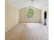 An expansive bedroom features a large arched window providing natural light and a spacious closet at 318 Linsbury Ct, Gastonia, NC 28056