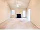 Spacious living room featuring a fireplace, neutral walls and a bright and open atmosphere at 318 Linsbury Ct, Gastonia, NC 28056