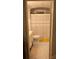 Cozy bathroom featuring gray-striped shower curtain, tiled floors, and a modern vanity sink at 324 N 5Th St, Albemarle, NC 28001