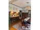 Elegant dining room featuring a buffet, hardwood floors, an ornate chandelier, and classic decor at 324 N 5Th St, Albemarle, NC 28001