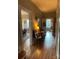 Inviting hallway with hardwood floors and view of other rooms at 324 N 5Th St, Albemarle, NC 28001