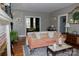 Cozy living room featuring hardwood floors, stylish furniture, and an open layout at 324 N 5Th St, Albemarle, NC 28001