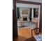 Cozy living room with fireplace, comfortable seating, and elegant decor seen from doorway at 324 N 5Th St, Albemarle, NC 28001