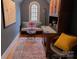 Charming home office with custom built-ins, a window seat, and a vintage desk setup at 324 N 5Th St, Albemarle, NC 28001