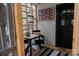 Enclosed sunroom with stained glass decor and a table setting, creating a peaceful retreat at 324 N 5Th St, Albemarle, NC 28001