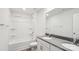 Modern bathroom featuring a double sink vanity, tub, shower with sliding glass, and a toilet, creating a functional space at 4016 Cramer Estates Ct, Gastonia, NC 28056