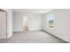 Carpeted bedroom with bright light from a window with an ensuite bathroom at 4016 Cramer Estates Ct, Gastonia, NC 28056