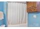 Bathroom with shower, tub and mounted cabinet for storage at 42 Linford St, Belmont, NC 28012