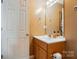 Bathroom featuring a vanity with sink, mirror, and essential toiletries displayed at 42 Linford St, Belmont, NC 28012