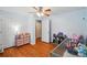 Comfortable bedroom featuring natural light, ceiling fan, and functional furniture at 42 Linford St, Belmont, NC 28012