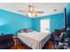 Bright bedroom with wood floors, a ceiling fan and natural light at 42 Linford St, Belmont, NC 28012