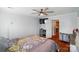 Bedroom showcases a ceiling fan, wood floors, and modern decor elements at 42 Linford St, Belmont, NC 28012