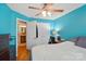 Bright bedroom features a closet, en suite bathroom, desk, and natural light at 42 Linford St, Belmont, NC 28012