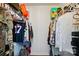 A walk-in closet with organized clothing, providing ample storage space at 42 Linford St, Belmont, NC 28012