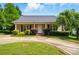 Well-manicured front yard and exterior view of this charming one story home at 42 Linford St, Belmont, NC 28012