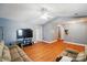 Spacious living room featuring wood floors and a vaulted ceiling for added appeal at 42 Linford St, Belmont, NC 28012