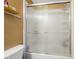 Shower area enclosed by textured glass doors, offering a private bathing space at 42 Linford St, Belmont, NC 28012