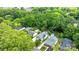 Bird's eye view of a quiet, tree-filled neighborhood with a mix of single-Gathering homes at 509 W Sixth Ave, Gastonia, NC 28052
