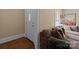Inviting entryway with hardwood floors, decor, and a Grand Canyon art piece at 509 W Sixth Ave, Gastonia, NC 28052