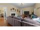Cozy living room with fireplace, hardwood floors, large sofa and natural light at 509 W Sixth Ave, Gastonia, NC 28052