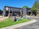 The Vaulted Oak Brewing exterior with outdoor seating and barrel accents at 5210 Kelly St, Charlotte, NC 28205