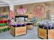 Interior view of Trader Joe's market with floral displays and merchandise at 5210 Kelly St, Charlotte, NC 28205