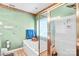 Well-kept bathroom featuring a shower and bathtub combo with a gold shower door frame at 5238 Downing Creek Dr, Charlotte, NC 28269