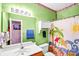 Bathroom featuring single vanity, toilet, shower with curtain and bright green walls at 5238 Downing Creek Dr, Charlotte, NC 28269