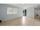 Bright living room featuring neutral paint, tile flooring and lots of natural light at 529 Dedmon Dr, Charlotte, NC 28216