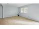 Bright living room featuring neutral paint, tile flooring and lots of natural light at 529 Dedmon Dr, Charlotte, NC 28216