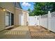 The backyard offers a private outdoor area, storage closet, and access to the rest of the yard at 541 River Park Rd, Belmont, NC 28012