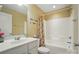 Bathroom with shower-tub combination, sink and large mirror with vanity lighting at 541 River Park Rd, Belmont, NC 28012