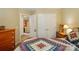 This bedroom offers a spacious closet and convenient access to other areas of the home at 541 River Park Rd, Belmont, NC 28012