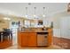 Kitchen with stainless appliances and open view to dining and living spaces at 541 River Park Rd, Belmont, NC 28012