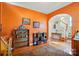 Vibrant living room showcases hardwood floors, arched entryway, a staircase, and tasteful decor at 541 River Park Rd, Belmont, NC 28012