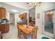 Open dining area with ample seating and natural light, next to the kitchen at 5550 Monticello Nw Dr, Concord, NC 28027