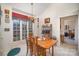 Cozy dining area filled with natural light, complemented by a wooden table and decorative touches at 5550 Monticello Nw Dr, Concord, NC 28027