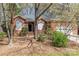 Charming brick home featuring well-maintained landscaping and a welcoming front entrance at 5550 Monticello Nw Dr, Concord, NC 28027